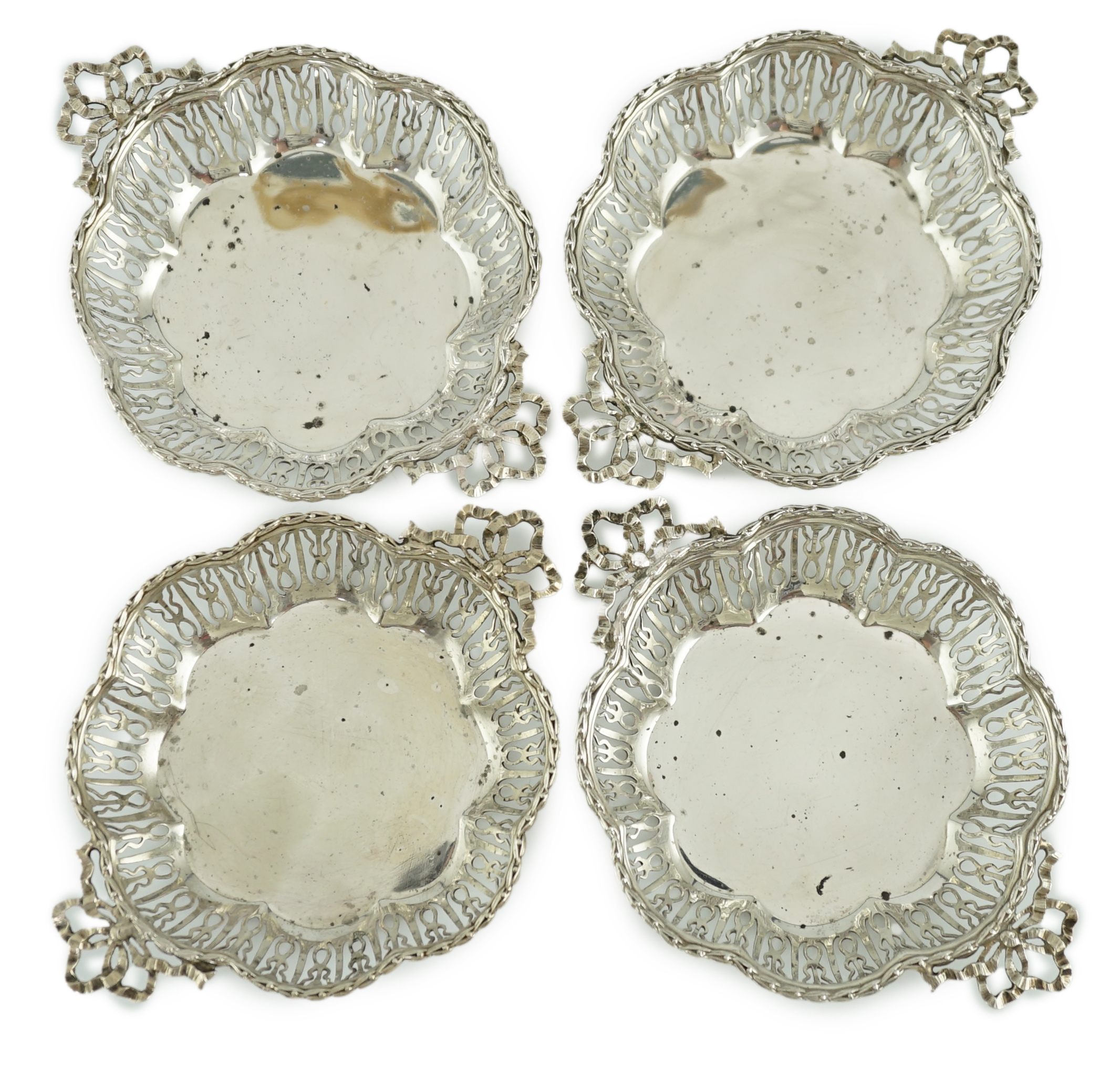 A set of four George V pierced silver bon bon dishes, by Mappin & Webb